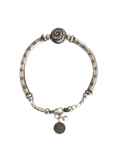 silver bracelet with spiral shell