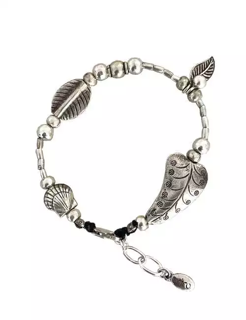 silver bracelet with warped heart