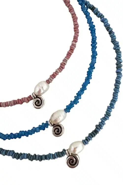 heishi glass beaded necklace with single pearl and silver spiral charm. Short length handmade necklace