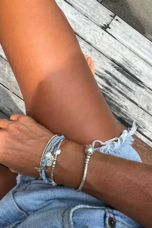 java glass blue bracelet with tiny natural shell and blue floating bead ocean inspired bracelet water safe