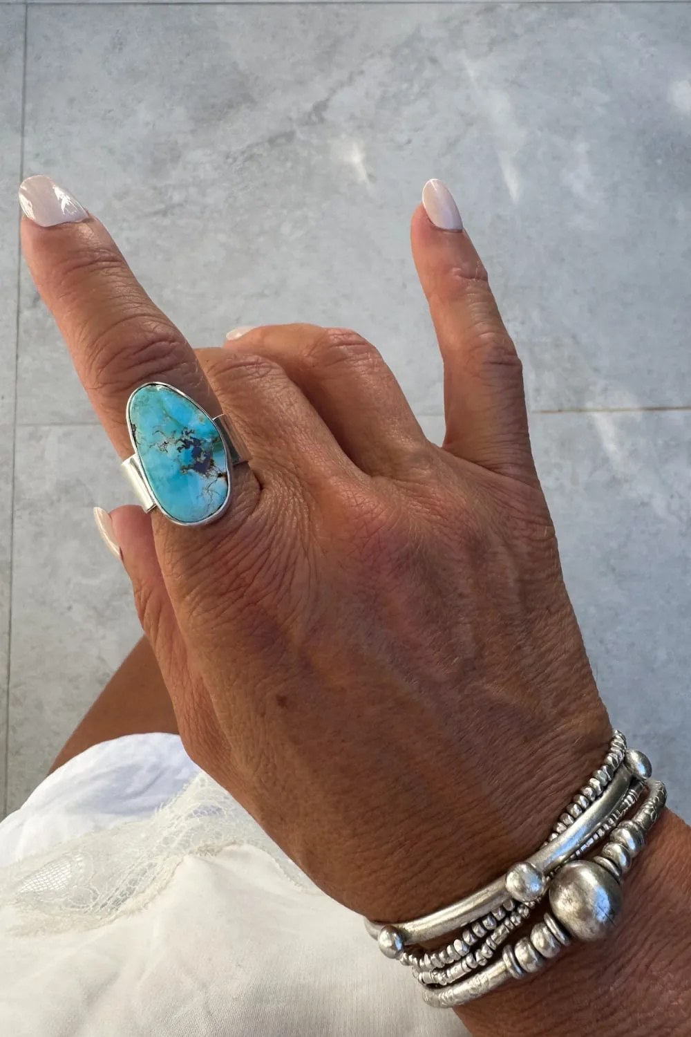 feature gemstone ring with large natural hebeoi turquoise gemstone sterling silver ring.
