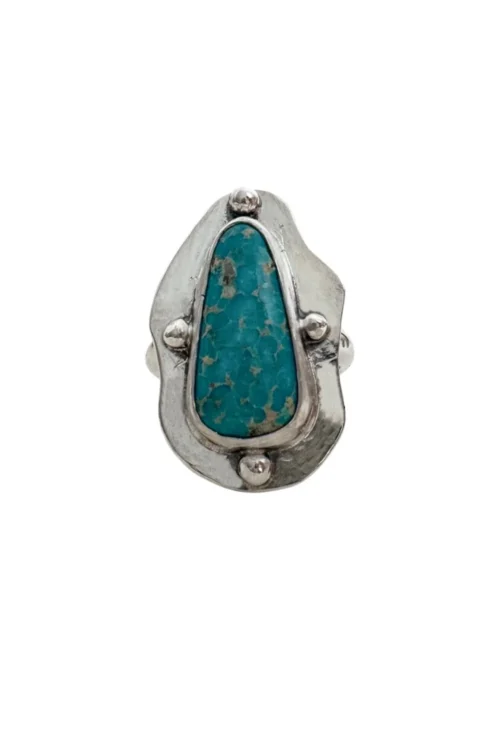 hand cut organic sterling silver ring with natural turquoise gemstone.